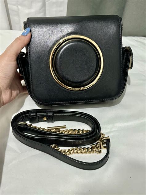 realsed date of michael kors scout camera bag|Michael Kors serial number lookup.